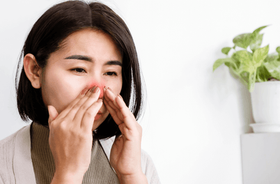 A woman affected by nasal congestion