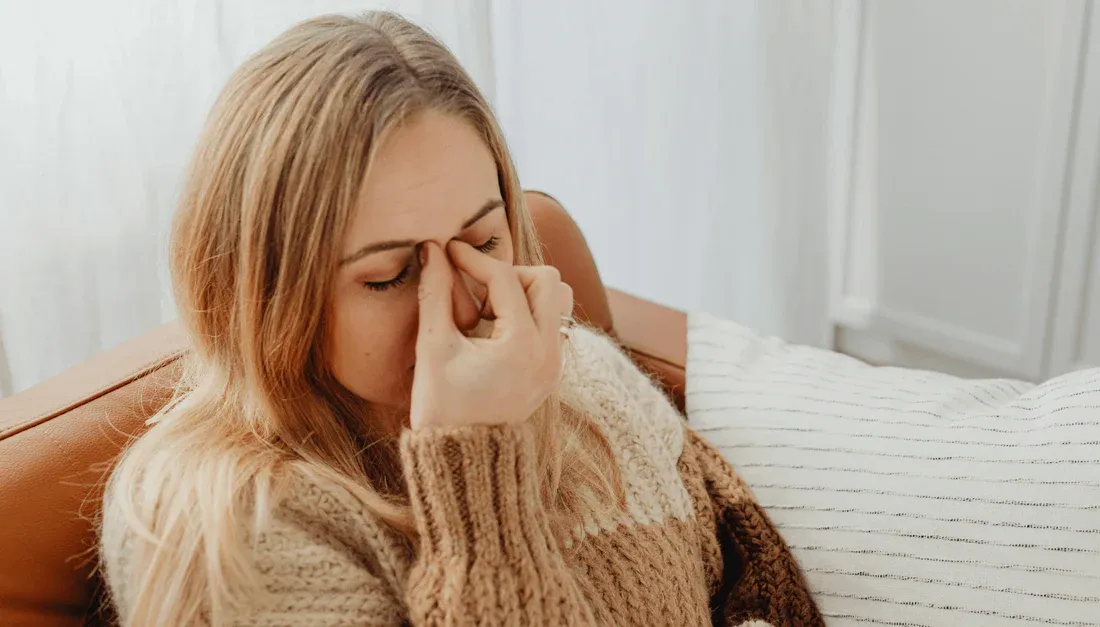 A Women with Sinus Headache