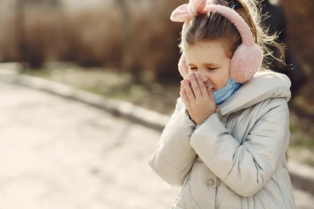 A kid suffering from wet cough