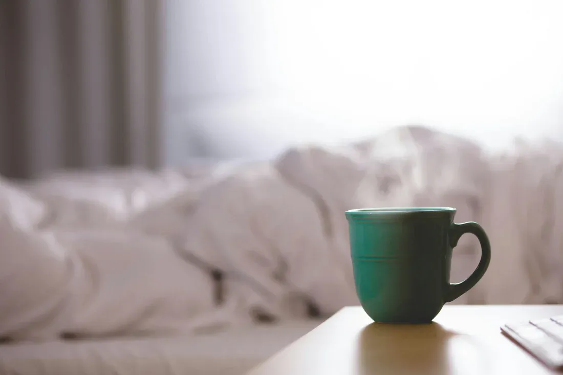 A hot water mug placed on a table