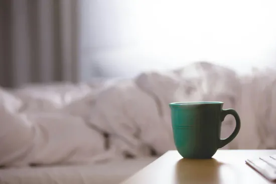 A hot water mug placed on a table