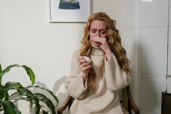 A Women suffering from Nasal Congestion