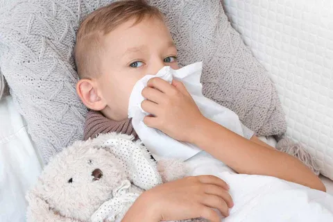 A_young_boy_in_bed_with_a_constant_runny_nose_480x480.webp